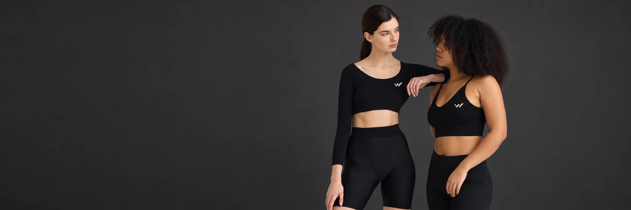 Two women wearing Willpower training apparel